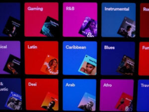 Grid of colorful music genre tiles on screen.